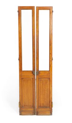 pair of antique oak double doors with glass panels