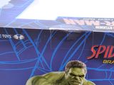 avengers spider - man action figure in a box on a table