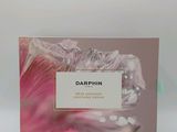 conception du packaging du parfum Darphin, mettant en avant une fleur rose et blanche