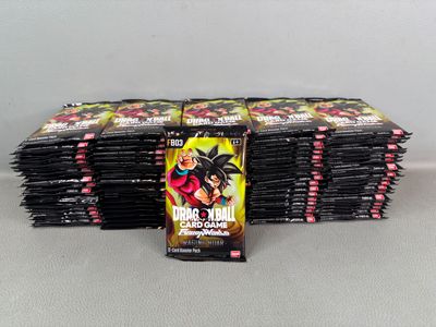 a pile of dragon ball trading cards sitting on top of each other