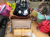 many bags on a table in a store