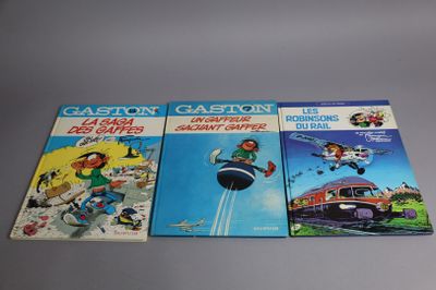 three children ' s books are lined up on a table