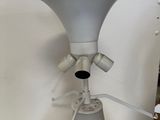 a lamp that is on a table in a room