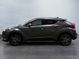 2020 toyota c - hr in a studio setting with a gray background