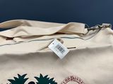 a white bag with a pineapple design on it