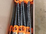 a box with a bunch of tools in it on the floor
