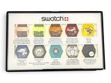 a picture of a picture of a swatch watch display
