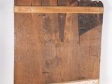 an old wooden board with a piece of wood sticking out of it ' s side