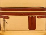 an open suitcase with a handle on it