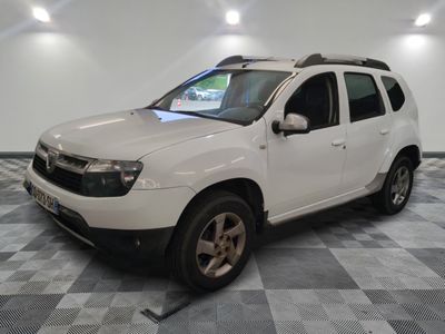 a picture of a white dacia parked in a garage