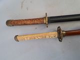 two different types of knives on the table