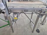 une photo d'une machine qui travaille sur une pièce de métal