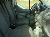a view of the inside of a van from the driver ' s seat