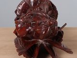 a close up of a wooden object on a table