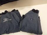 two pieces of clothing that are sitting on a table