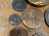 a lot of coins that are on a table