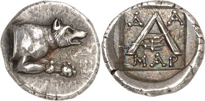 a close up of a silver coin with a dog on it