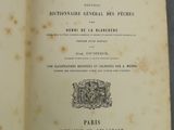 un livre ouvert avec la photo d'un homme et d'une femme