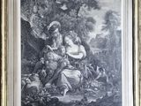 a framed picture of a man and woman in a wooded setting