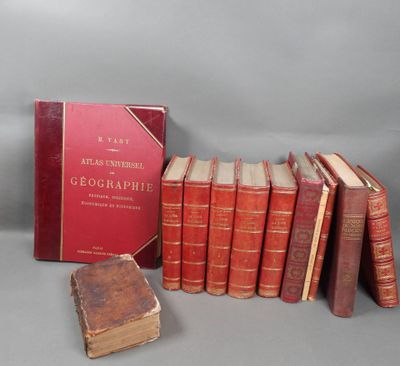 a group of books sitting on top of a table next to each other