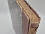 a book that is open on a white surface