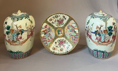 three vases are sitting on a table with a white background