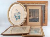 three framed pictures and a picture of a woman in a blue dress