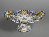 a decorative bowl that is sitting on a table