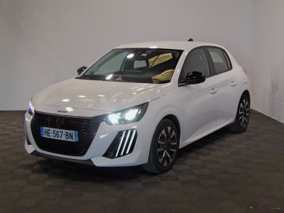 the white car is parked in a large room with a checkered floor