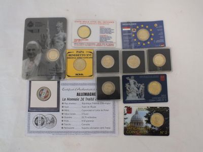 some of the coins and cards are on the table