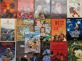 a lot of books that are on the wall