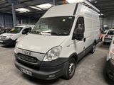 a white van that is parked in a garage