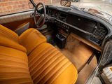 a car that is sitting inside of a building