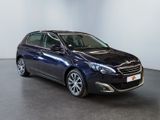 the blue car is parked in a white room with a black floor