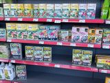 many different types of teas on the shelves in the store