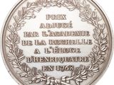 a close up of a medal on a white background
