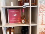 many bottles of wine on the shelves in the room