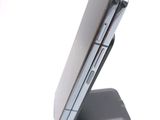 a cell phone that is sitting on top of a stand