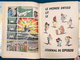 someone is holding a book open to a page of comics