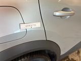 a close up of a car door with a sticker on it