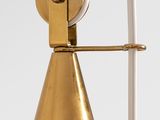 a close up of a light fixture on a wall
