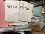 a box full of old papers and other items