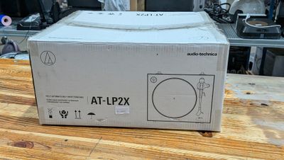 a box that is sitting on a wooden table