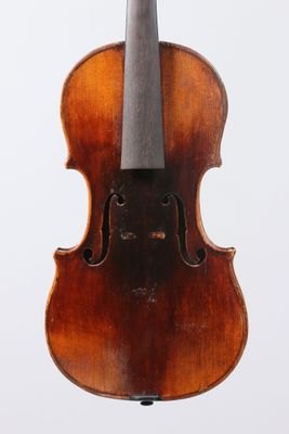 an old violin with a bow on a white background