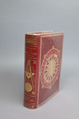 a red book with a gold clock on it