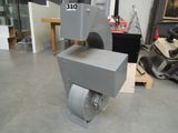 a machine that is sitting on the floor in a room