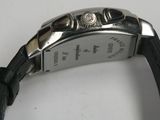 an image of a close up of a wrist watch on a white surface