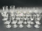 a lot of empty wine glasses sitting on a table