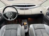 a picture of a car dashboard with a steering wheel and dashboard buttons