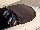 a close up of a car ' s interior with the top down